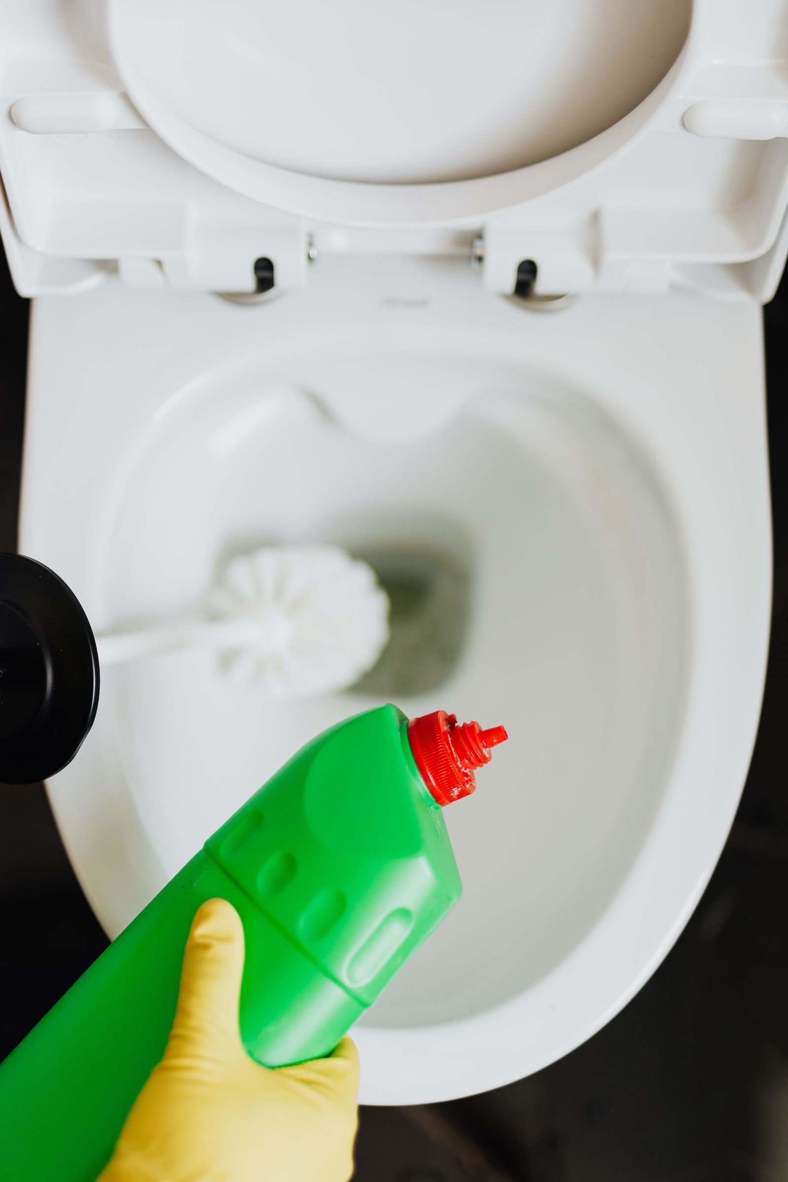 Under-sink garbage disposal repair in an Austin kitchen