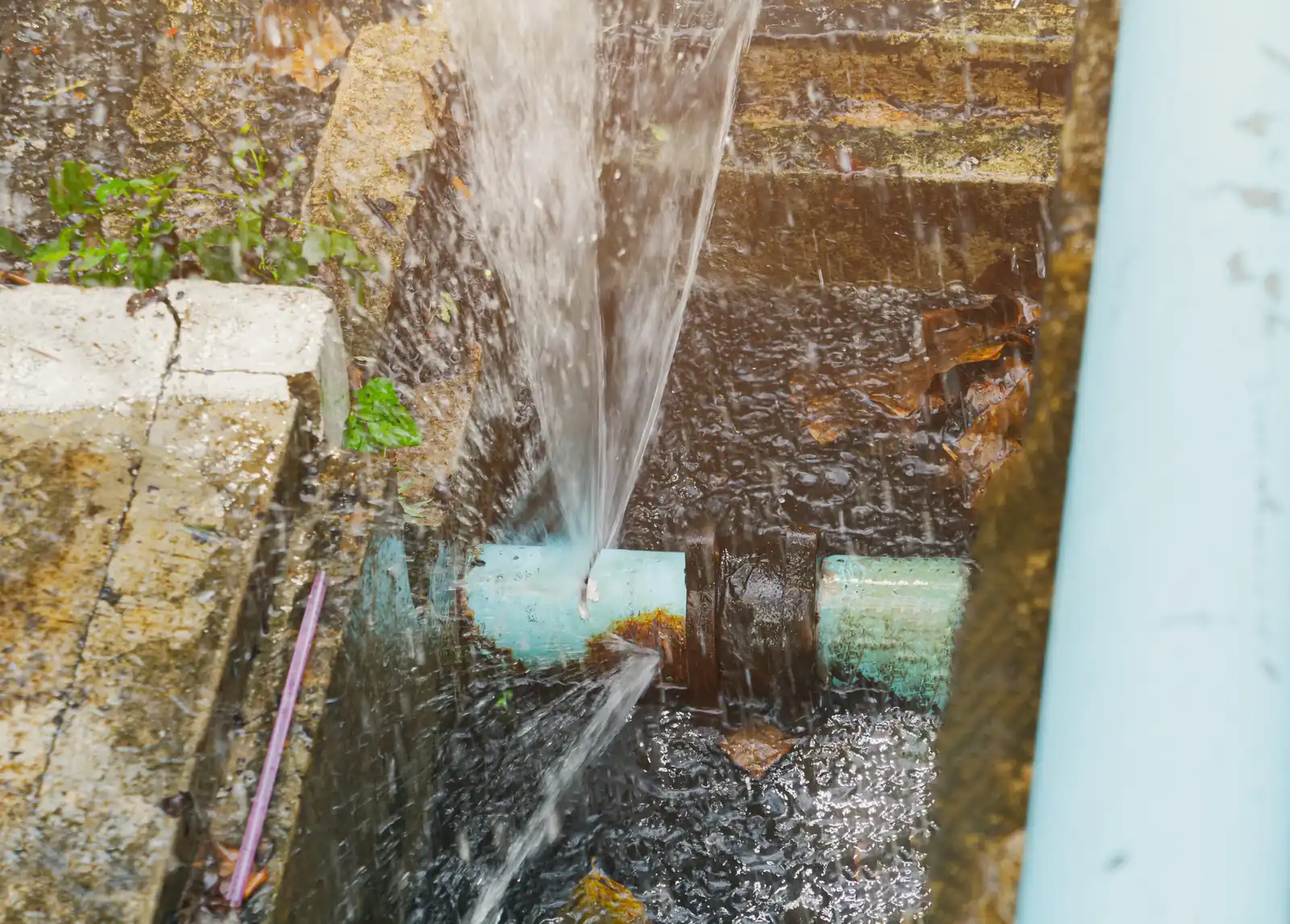 Broken under-slab water line exposed for repair — drought-cycle clay movement drives San Antonio, TX slab leak clusters